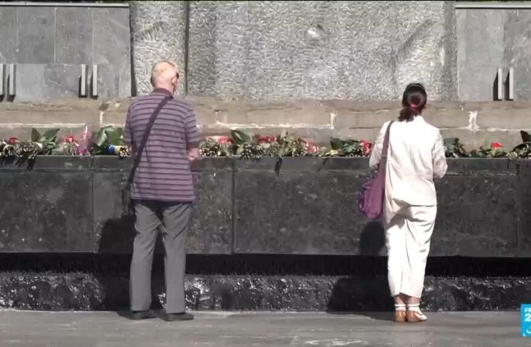 Ukrainians mark end of WWII amid fragile ceasefire with Russia